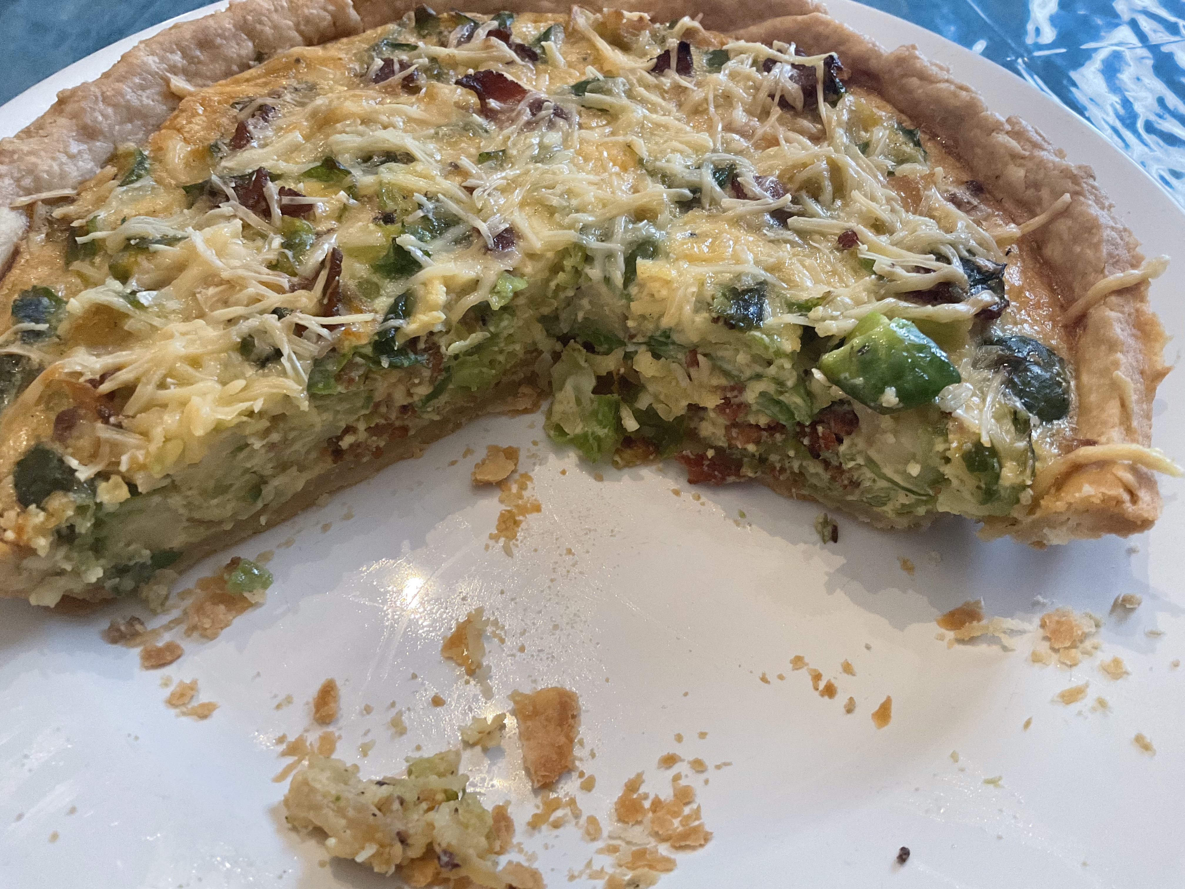 Onion, Brussels sprouts & potato quiche slice