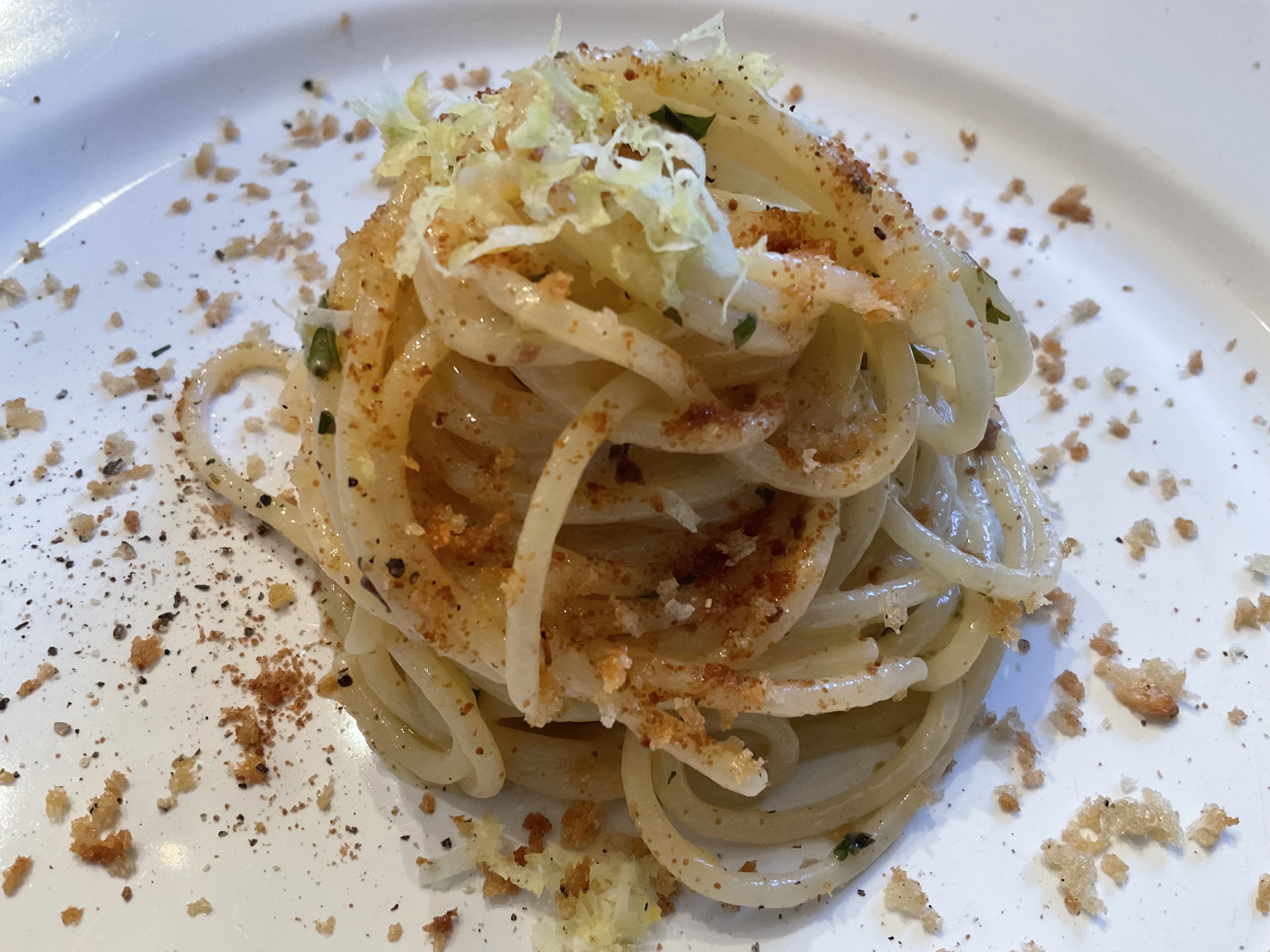 Spaghetti with tuna bottarga, lemon zest, and toasted breadcrumbs