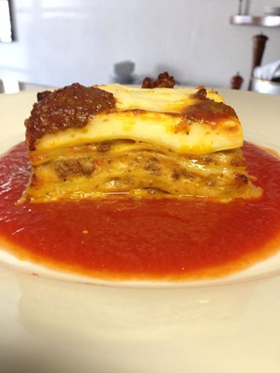 Tuscan beef ragout lasagna baked with béchamel and Parmigiano