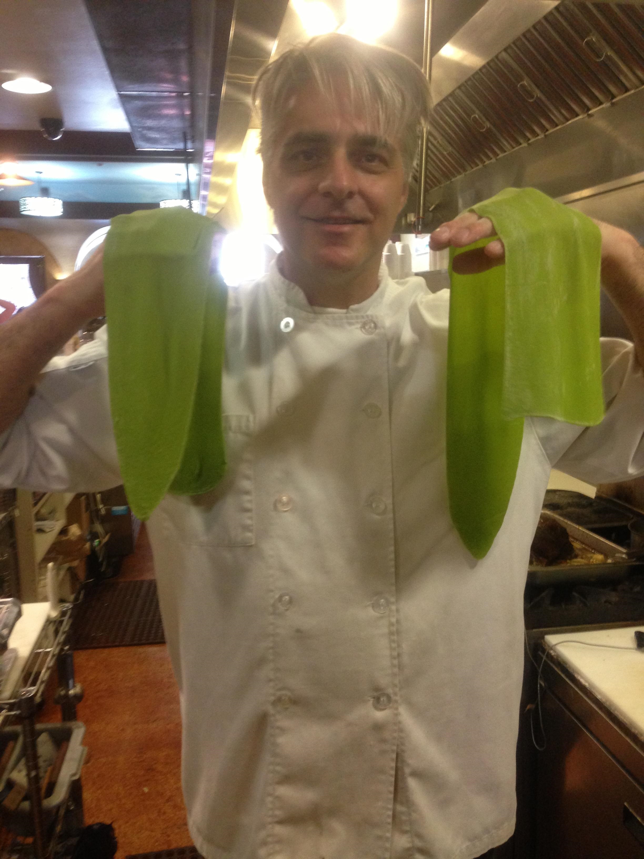 Spinach pasta dough on top of the recipe card