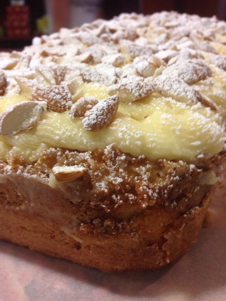 Almond milk soaked sponge cake with custard and toasted almonds