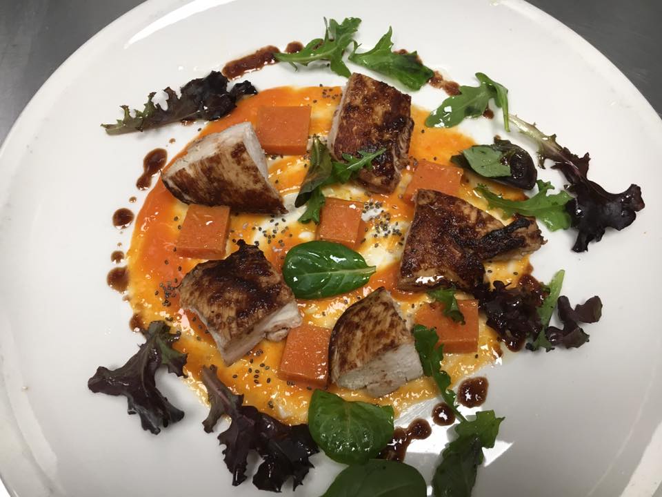 Smoked chicken and persimmon salad with baby greens